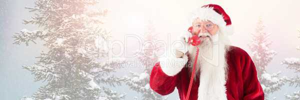 Santa Claus in Winter with phone