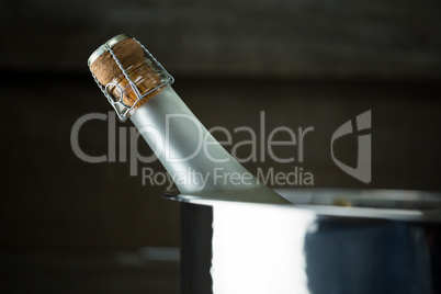 Champagne bottle in a silver ice bucket