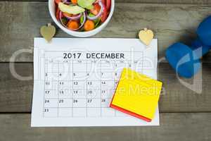 Calendar with new year resolution and diet food