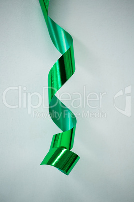 Green streamers on white background