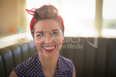 Smiling woman in restaurant