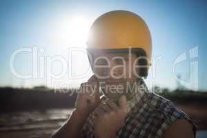 Man wearing a helmet on a sunny day