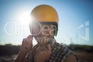 Man wearing a helmet on a sunny day