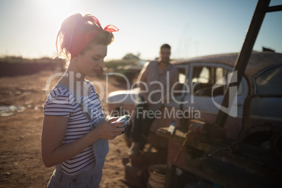 Woman holding a vintage camera