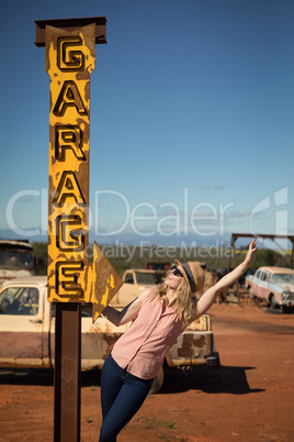 Woman playing with a pole