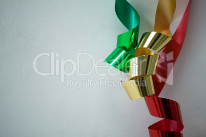 Green and red ribbons on white background