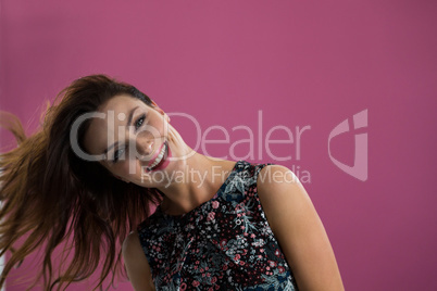 Woman tossing her long hair