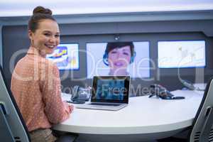 Portrait of female executive having video call in boardroom
