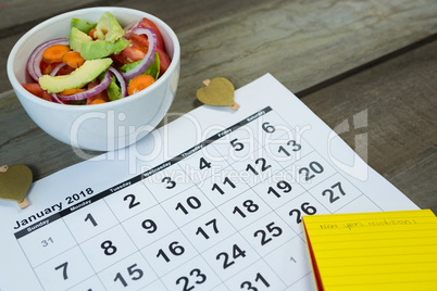 Calendar with new year resolution and diet food