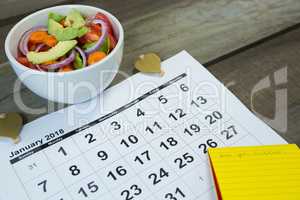 Calendar with new year resolution and diet food