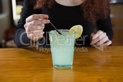 Waitress making a drink