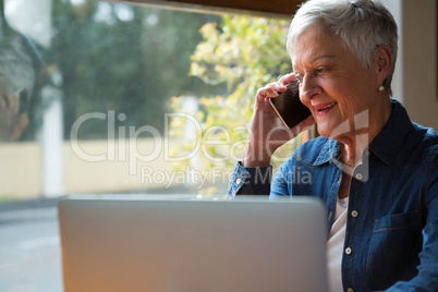 Senior woman talking on mobile phone