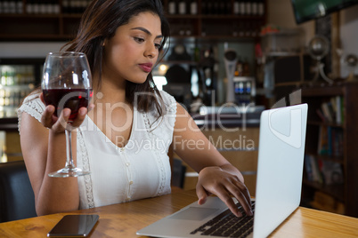 Woman using laptop