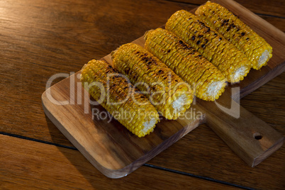 Corn on wooden tray