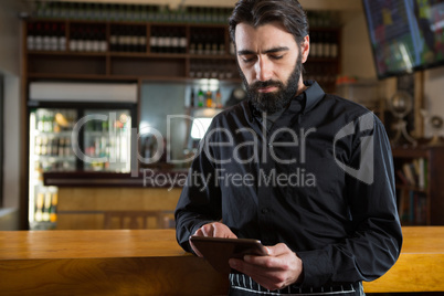 Man using digital tablet