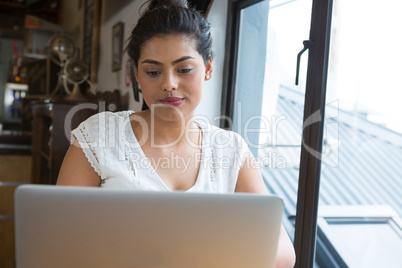 Woman using laptop