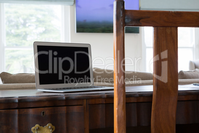 Laptop on wooden table