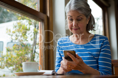 Senior woman using mobile phone