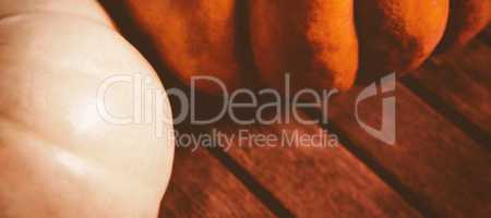 Close up of pumpkins on wooden table