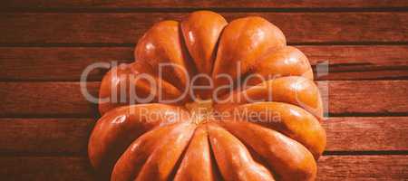 View of pumpkin on wooden table during Halloween