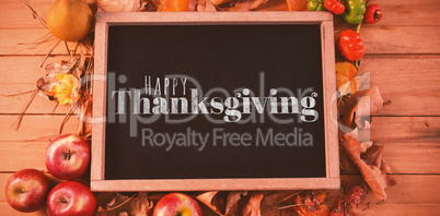 Composite image of digitally generated image of happy thanksgiving text