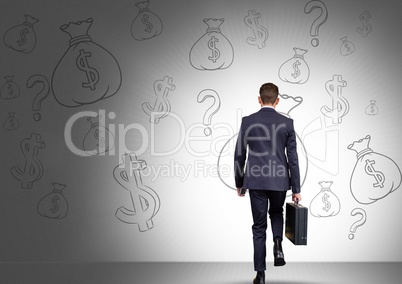 man in front of money on wall