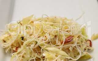 Healthy Asian cabbage, rice pasta and almond salad