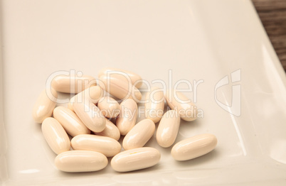 White gel capsules of vitamin Co Q-10