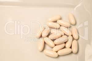 White gel capsules of vitamin Co Q-10