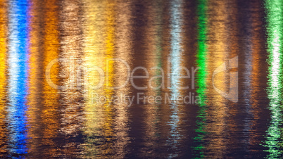 Colorful reflection on the water at night