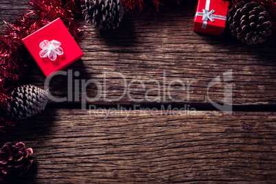 Christmas decoration and gift boxes on wooden table