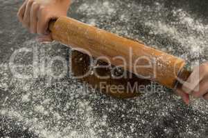 Hand baking dough with rolling pin