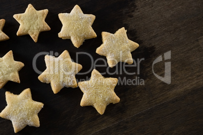 Gingerbread cookies with powdered sugar sprinkled on top