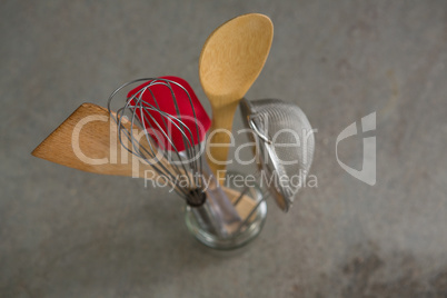 Whisker, wooden spoon, strainer and spatula