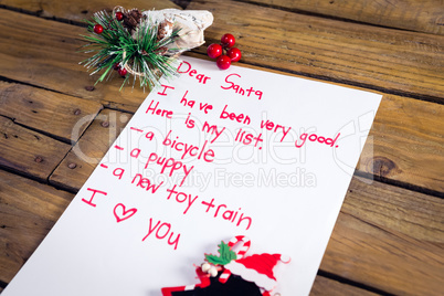 A letter to santa on wooden table
