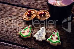 Christmas cookies on wooden plank