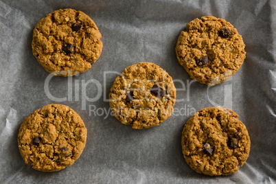 Freshly baked cookies on wax paper