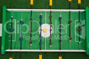 Table soccer game on artificial grass