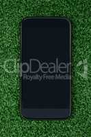 Mobile phone on artificial grass