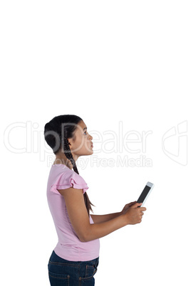 Girl holding digital tablet against white background