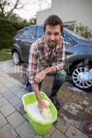 Man washing a car