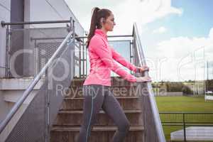 Woman standing in the stairs