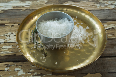 Bowl of salt in a plate