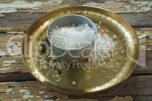 Bowl of salt in a plate