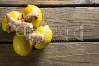Lemons and ginger on table