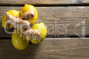 Lemons and ginger on table