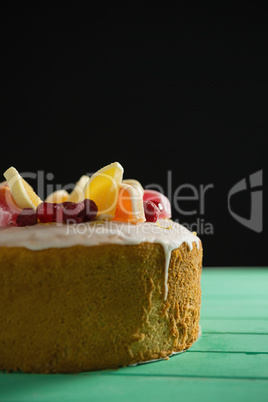 Close up of fruits on dessert at table