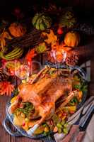 Christmas goose with pumpkin and fruit filling