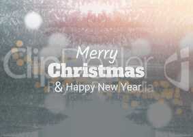 merry Christmas and happy new year text on snow background, bokeh