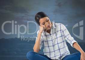 Businesswoman depressed and disappointed  with blue landscape